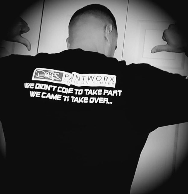 Black and white of back of Tshirt with logo and tagline
